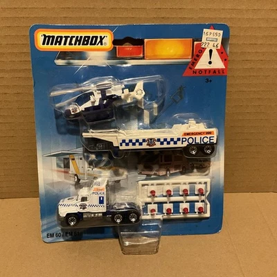 MATCHBOX EM 60 / EM 61 MACK TRUCK & TRAILER  POLICE UNIT- ON CARD - Image 1 of 4