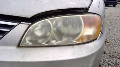 Conjunto de faros izquierdos usados se adapta a: Kia Spectra Sdn 2003 4 puertas izquierda grado A Foto 1 de 4