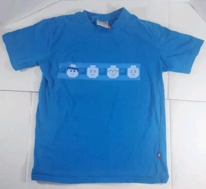Camiseta Lego Collection. Azul con cuatro mini cabezas de higuera para hombre pequeñas. Raro - Imagen 1 de 6
