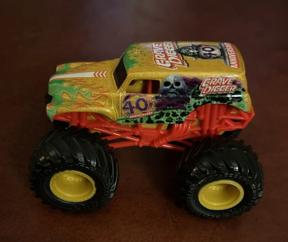 GOLD Spin Master Monster Jam 40th Anniversary Grave Digger Truck 1:64 New - image 1 of 4