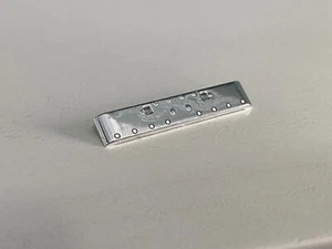DCP 1/64 PETERBILT 389 CHROME STOCK BUMPER FITS 389 W/ LIGHTS PLASTIC OLD STYLE - Picture 1 of 1