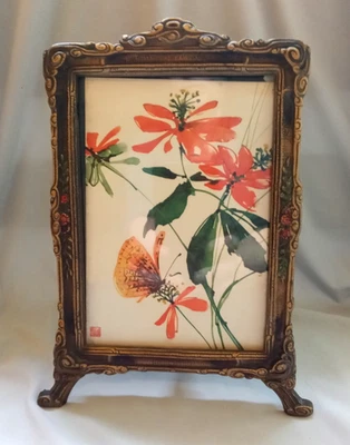 Antiguo marco de fotos de mesa de hierro fundido policromado con vidrio Foto 1 de 4