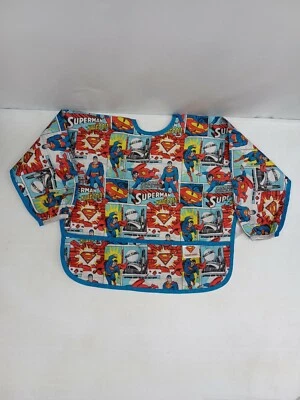 Babero De Colección Bumkins Superman Con Bolsillos Niños Niños Niñas Manga Larga Foto 1 de 4