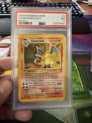 2000 Pokemon Charizard Holo Base Set 2 Holo Fire Swirl PSA 7 NM #4 - Image 1 of 2
