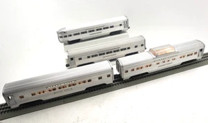 Lionel, O, 2531-4, Juego de cuatro vagones de pasajeros iluminados plateados, C-7 excelente - Imagen 1 de 24