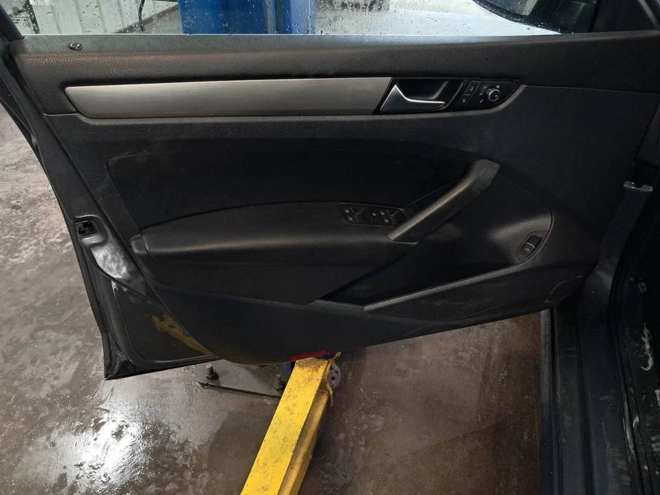 2014 Volkswagen Passat Left Front Door Trim Panel - Used, Black, OEM - Image 1 of 4