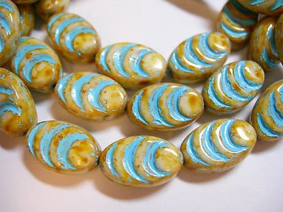  12 13x8mm Czech Glass Cream w/ Turquoise wash Oval Grooved Beads - Image 1 of 2