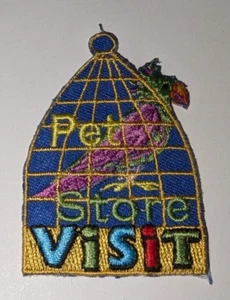 Pfadfinderinnen Zoohandlung Besuch Welt Spaß Aufnäher Patch Abzeichen ANLEITUNG NEU Vogelkäfig - Bild 1 von 3