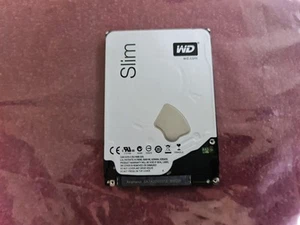Western Digital WD10SPCX-24HWST1 WD Blue 1TB 2.5" HDD SATA - Afbeelding 1 van 2