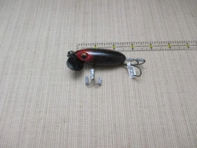 Рыболовная приманка Fred Arbogast JITTERBUG 5/8 унций ПЛАСТИКОВАЯ ГУБА ВРЕМЕН ВТОРОЙ МИРОВОЙ ВОЙНЫ ЗОЛОТЫЕ БУКВЫ - Изображение 1 из 4