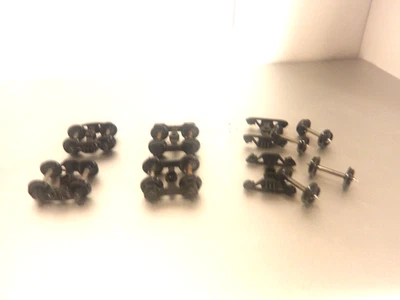 HO Roundhouse Plastic 33" Trucks w/ nylon wheels and metal axels, used. - Image 1 of 4