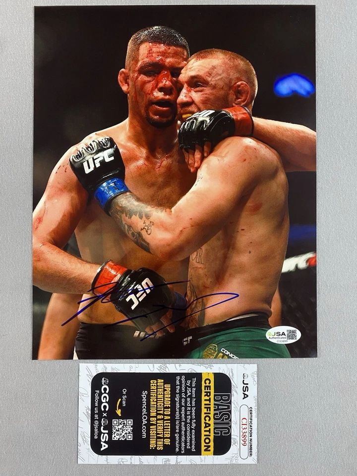 NATE DIAZ AUTOGRAPH 8x10 FIGHT VICTORY PHOTO UFC/MMA vs McGREGOR JSA CI33899 - Image 1 of 1