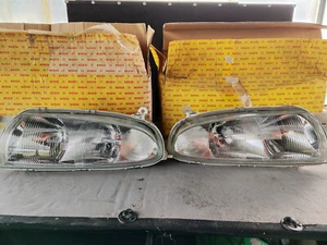 Headlight FORD FIESTA / MAZDA 121 BOSCH 0301049003 03010490034 ORIGNAL OEM - Picture 1 of 9