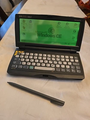 Hewlett Packard HP 320LX Palmtop PC 1997 TESTED - Batteries installed, no cable. - Image 1 of 4