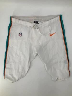 PANTALONES NIKE BLANCOS EMITIDOS POR EL EQUIPO MIAMI DOLPHINS/JUEGO USADOS SIN MALLA TODAS LAS TALLAS Foto 1 de 4