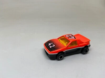 MAJORETTE--PONTIAC FIERO-- #206--ORANGE/BLACK---NICE - Image 1 of 4