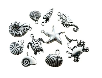 10 Assorted Beach Ocean Seashells Shells Silver Metal Bead Art Charms Pendants - Image 1 of 3
