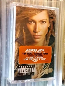 JENNIFER LOPEZ JLo CASSETTE 2001 USA EDITION HYPE STICKER I'M REAL REMIX SEALED - Picture 1 of 4
