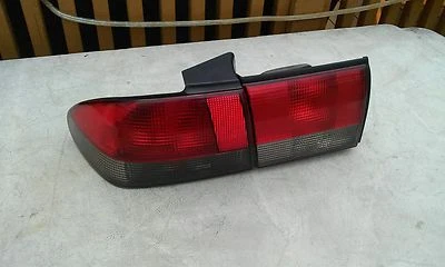 SAAB 900 TAIL LIGHTS DRIVER SIDE (BOTH PIECES) 1994,1995,1996,1997,1998 - Image 1 of 2