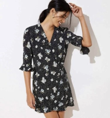 Mameluco femenino clásico envolvente con volantes florales a lunares negro blanco azul 0 Foto 1 de 4