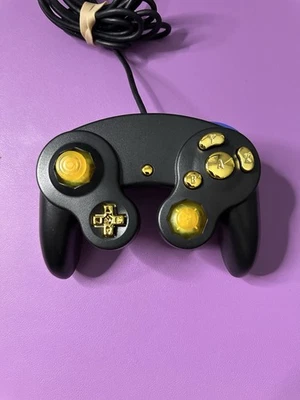 Controlador GameCube personalizado - negro y dorado Foto 1 de 4