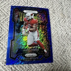 2023 Panini Prizm James Conner Blue Shimmer FOTL /25 #5 - Bild 1 von 10
