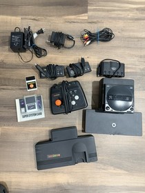 Turbo Grafx 16 with CD player, power adaptor,  super system card, controllers.