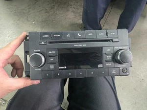2007-2014 Chrysler Dodge Jeep AM FM Radio CD Player Aux OEM P05091258AC - Picture 1 of 3