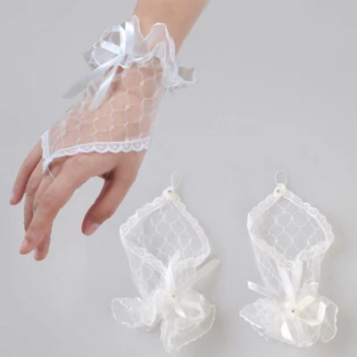 Guantes cortos de encaje con moño sin dedos para dama accesorio de vestido de novia EE. UU. Foto 1 de 4