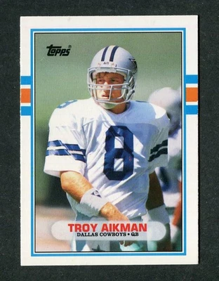 Troy Aikman Cowboys NFL Rookie Quarterback 1989 Topps Traded Football Card #70T - Image 1 of 2