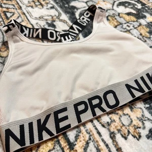 Nike Pro Dri Fit Sports Bra Unpadded Black Logo Band White Womens XS - Picture 1 of 7