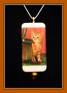 ORANGE TABBY KITTEN WAITING FOR FALL PENDANT - Picture 1 of 1