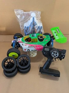 Kyosho Inferno MP7.5 RC Buggy mit Reifen Räder und Ersatzkarosserie RC Auto Set - Bild 1 von 10