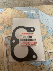 Suzuki #13125-87E00 Gasket. SKU: 40990-D-A175-38KF - Foto 1 di 1