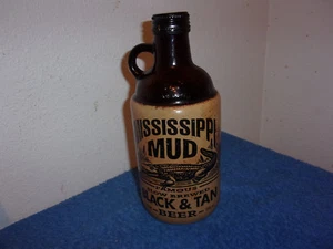 VINTAGE MISSISSIPPI MUD BLACK & TAN EMPTY BROWN QT. GLASS BEER BOTTLE with CAP - Picture 1 of 6