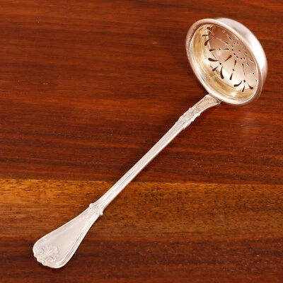 CUCHARA TAMIZADORA DANESA DE PLATA .826 / CUENTAS DE SERVIDOR DE GUISANTES, FOLIADA 1889 SIN MONOGRAMA Foto 1 de 4