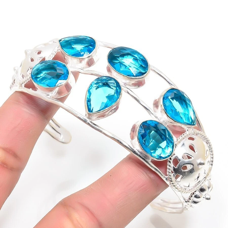 Brazalete ajustable de plata de ley 925 hecho a mano con piedras preciosas de topacio azul suizo Foto 1 de 1