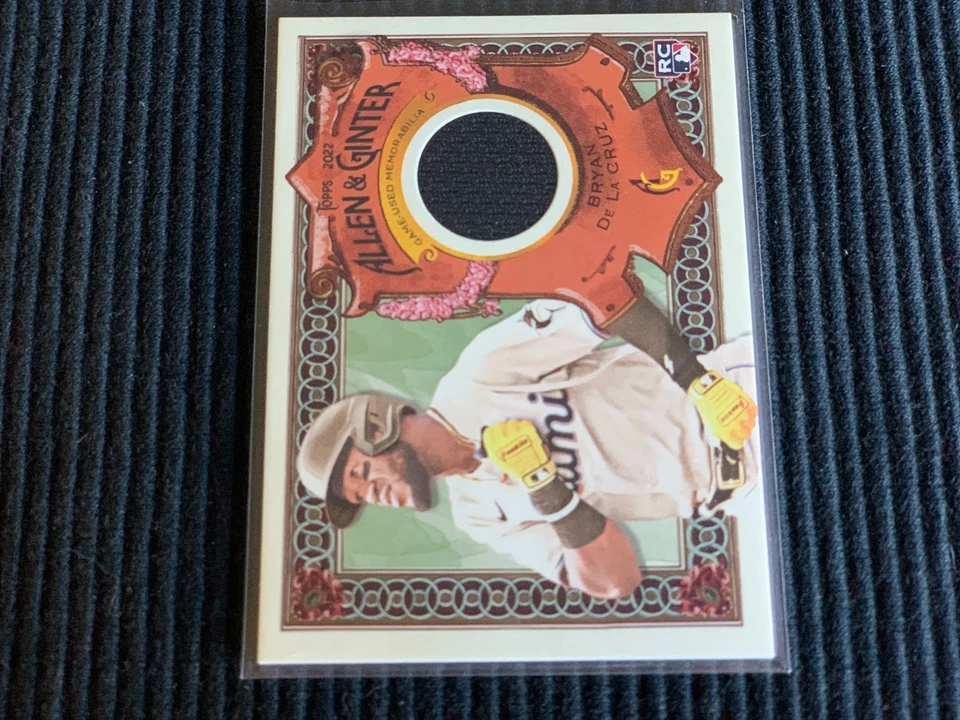 2022 TOPPS ALLEN GINTER BRYAN DE LA CRUZ *GAME JERSEY RELIC CARD*  MARLINS - Image 1 of 1