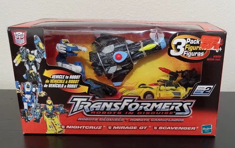 Transformers Universe Nightcruz/Mirage GT/Scavenger 3-Pack - MISB Cover