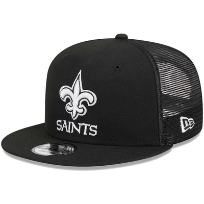 Gorra New Era 9FIFTY NFL New Orleans Saints negra camionero principal para hombre con cierre a presión Foto 1 de 4