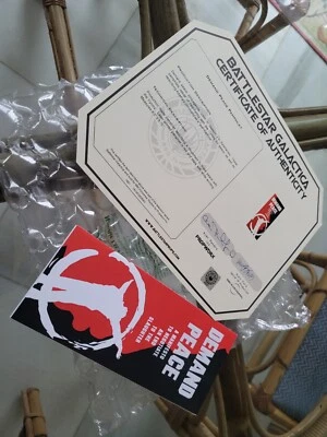 Programa de televisión Battlestar Galactica 2004 producción hecho utilería certificado de autenticidad demanda paz folleto Foto 1 de 4