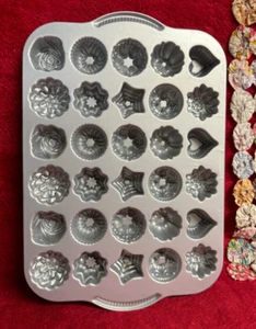 Nordicware Bundt Tea Cake & Candies Pan 10 Different Designs for 30 Holes - Picture 1 of 8