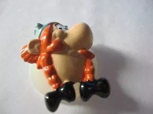 KINDER MONTABLE ASTERIX EN AMERIQUE 1995 *BOUTONNIERE OBELIX* - Foto 1 di 1