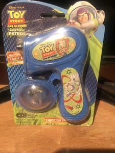 TOY STORY 2008 LIGHT UP MINI DISC SHOOTER - Bild 1 von 2