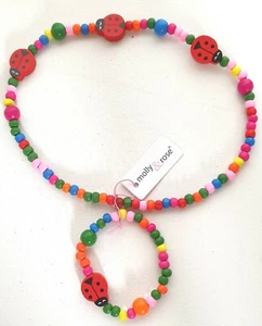 NEW Childrens bright red bead coloured wooden ladybird necklace bracelet set UK - Picture 1 of 1