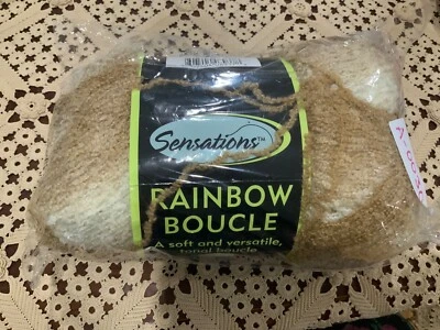 JO-ANN SENSATIONS ARCO IRIS ARCO IRIS BOUCLE Hilo Camello 11 OZ 853 Yardas Foto 1 de 4