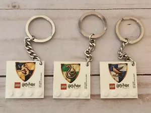 LEGO Harry Potter Haus Wappen Schlüsselanhänger Ring Lot 3 Slytherin Hufflepuff Ravenclaw - Bild 1 von 5