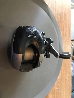 MITCHELL 400 X EXCELENCIA PERFIL BAJO 4 B. CARRETE DE PESCA B. BAITCASTING Foto 1 de 4