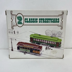 2 CLASSIC STREETCARS - HO SCALE - Powell & Mason and DESIRE STREET TROLLEYS - Picture 1 of 13