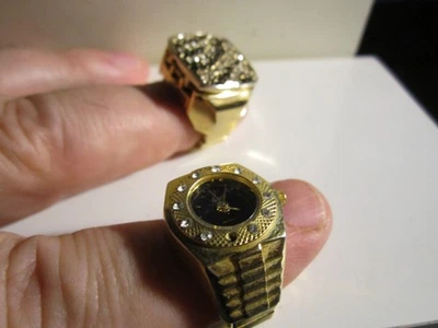 2 UHREN UHRRINGE - SOWOHL AUSGEFALLENE DESIGNS ALS AUCH BATTERIEN ZUM LAUFEN BENÖTIGEN - OFC-R1 - Bild 1 von 4